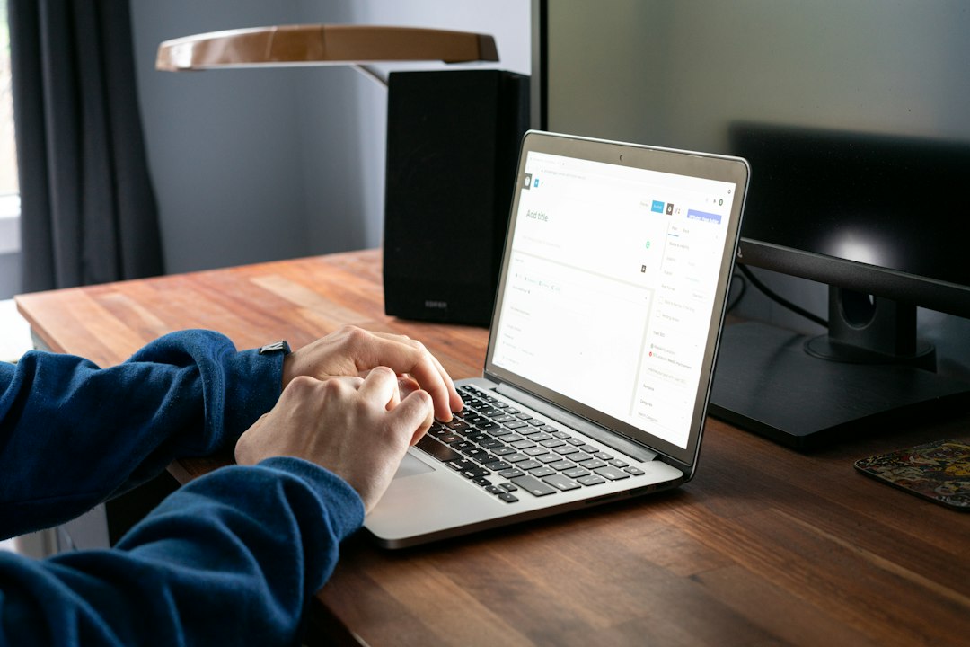 Person researching and comparing streaming options on a laptop