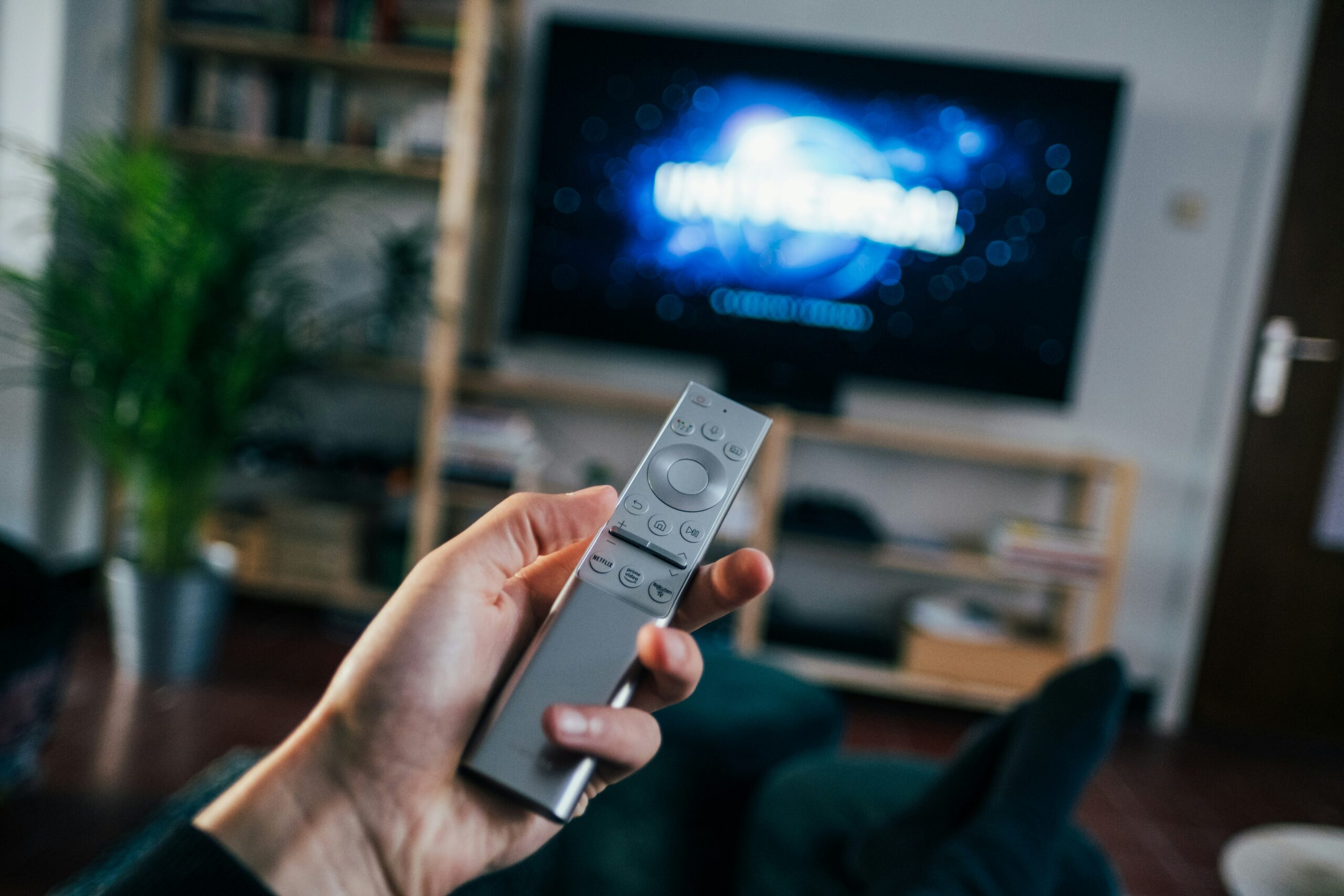 Smart TV and streaming setup illustrating IPTV playlist and login methods